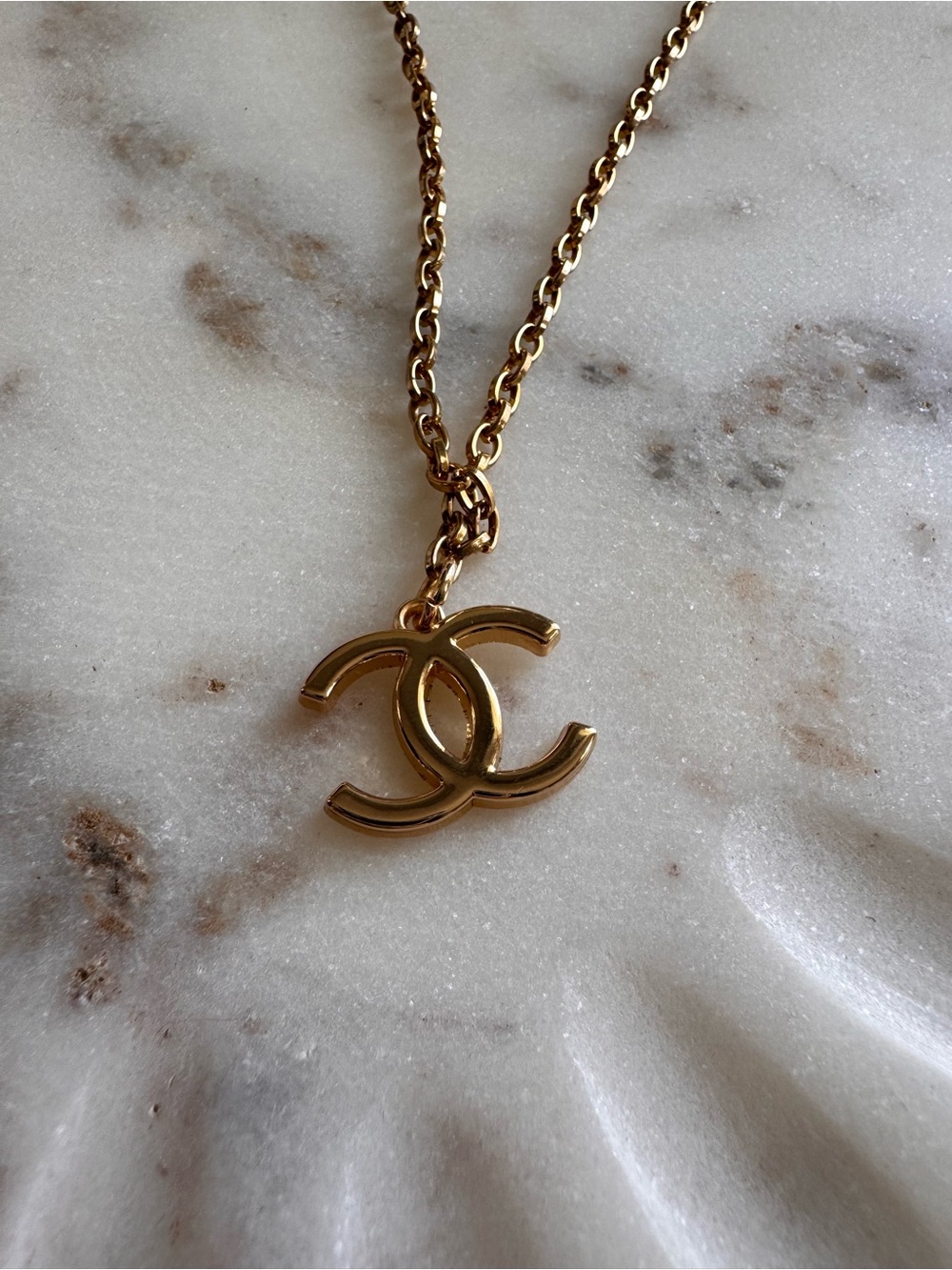 CHANEL Gold Tone Interlocking CC Logo Necklace